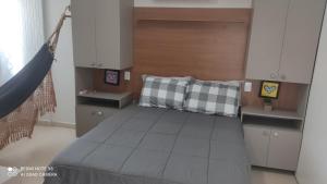 a bedroom with a large bed in a room at Estilo Bela Vista 308 in Cabedelo +13 photos