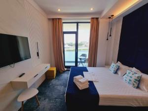 Кровать или кровати в номере Hotel Nava