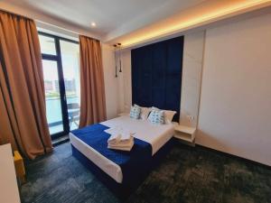 Кровать или кровати в номере Hotel Nava