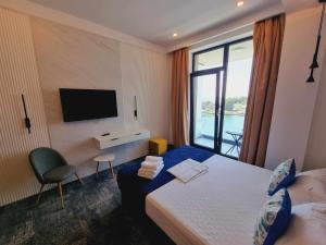 Кровать или кровати в номере Hotel Nava
