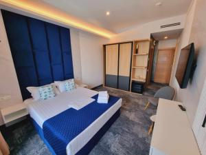 Кровать или кровати в номере Hotel Nava