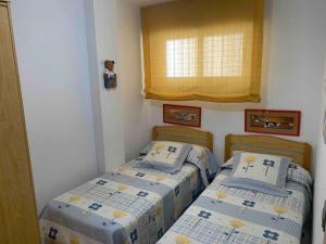 En eller flere senge i et værelse på El Raco + 2 billeder