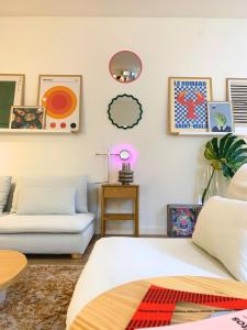 a living room with a bed and a couch at Nordic! 1 Bedroom Apartment in Puerto de la Cruz