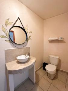 Kylpyhuone majoituspaikassa Hotel “El Dorado”