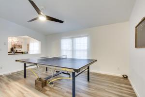 a ping pong table in a living room with a ceiling at Phoenix Family Home Near Cave Creek and Hiking! in Phoenix