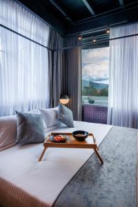 Postel nebo postele na pokoji v ubytování Hemma Bogotá Country Luxury Suites Hotel