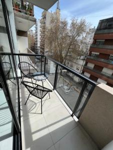 En balkong eller terrass på Departamento moderno 3 ambientes con cochera