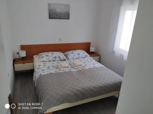 Posteľ alebo postele v izbe v ubytovaní Apartments by the sea Kuciste - Perna, Peljesac - 4544