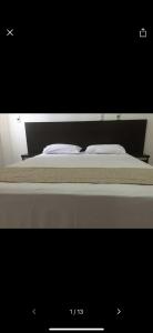 Una foto de una cama en una habitación en Hotel Cruzeiro de São José, en São Francisco de Goiás