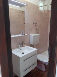 Koupelna v ubytování Apartment Tisno 17716b