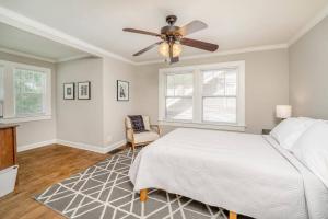 a bedroom with a bed and a ceiling fan at 3 Bed 1 5 Bath Home By College Hill & Hospitals in Wichita