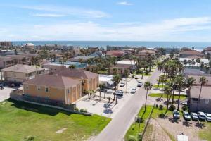 an aerial view of a residential neighborhood with a road and houses at Luxury 3 Bed 2 Bath 2nd Floor Condo By Beach in South Padre Island