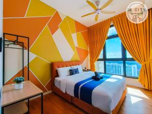 a bedroom with a bed with a colorful wall at Skudai Paradigm Mall by JBcity Home in Johor Bahru
