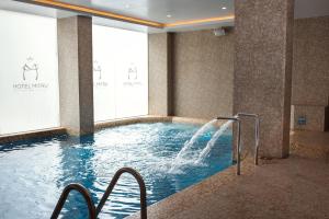 Bazén v ubytování Hotel Mitru Sur nebo v jeho okolí