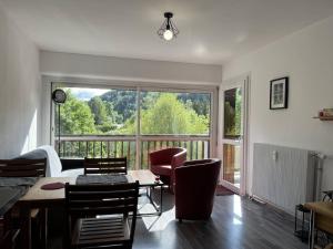 Posezení v ubytování Appartement fonctionnel à Villard-de-Lans, balcon, parking gratuit - FR-1-548-40