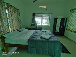 Surya cafe and stay sea view客房内的一张或多张床位