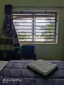Surya cafe and stay sea view客房内的一张或多张床位