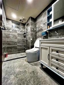 Phòng tắm tại Jing Cheng Homestay