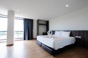 Postel nebo postele na pokoji v ubytování JS HOTEL