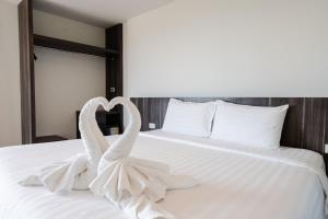 Postel nebo postele na pokoji v ubytování JS HOTEL