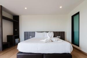 Postel nebo postele na pokoji v ubytování JS HOTEL