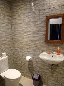A bathroom at Parama Homestay Balangan
