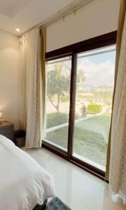 Katil atau katil-katil dalam bilik di Hawana VIP Private Apartment 2