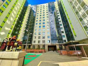 a large building with tall buildings in a city at Exclusive USA Embassy Proximity Apartments in Ulaanbaatar