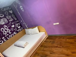 Letto o letti in una camera di Ye Yuan Star Homestay