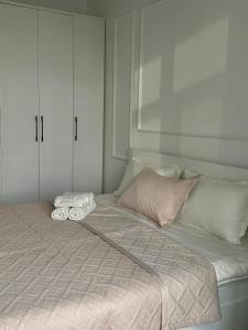 Ένα ή περισσότερα κρεβάτια σε δωμάτιο στο Stay Inn - 2-х комнатная квартира комфорт класса