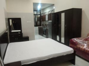 Postel nebo postele na pokoji v ubytování We welcome you to a quiet apartment that will make your stay wonderful - AL RAWDA 2 - AJMAN