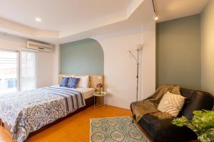 Säng eller sängar i ett rum på Baan Sinkaew Apartment Chiangmai - บ้านสินแก้ว อพาร์ทเม้นท์ เชียงใหม่