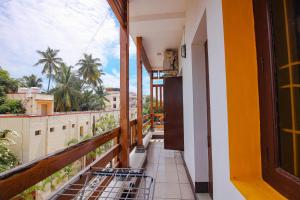 a balcony of a house with a shopping cart at Manora Residency in Puducherry