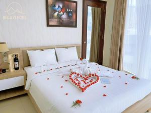 Postel nebo postele na pokoji v ubytování Bella Hotel Bai Sau Vung Tau
