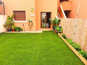Zahrada ubytování Espacioso apartamento con preciosos jardines y BBQ