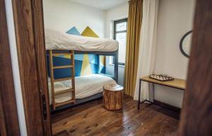 Postel nebo postele na pokoji v ubytování Chalet Lago