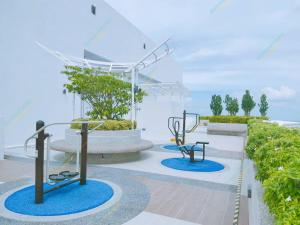 a rendering of a park with two exercise equipment at Diamond@Troika in Kota Bharu