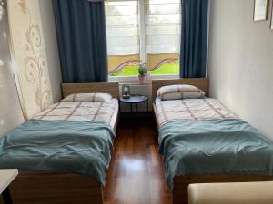 Billede fra billedgalleriet på Ruhiges Zimmer im Gasthaus i Essen