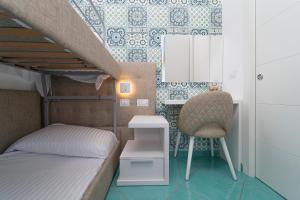Postel nebo postele na pokoji v ubytování Hotel Miramare