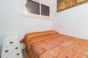 En eller flere senge i et værelse på 1 linea playa YATE