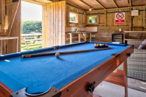 a pool table in a room with a pool table at House - Private use in Sedbergh