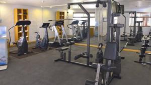 a gym with several tread machines in a room at Holiday Inn Express Morelia, an IHG Hotel in Morelia