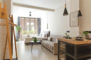 Posezení v ubytování Living Stone Condo Hotel