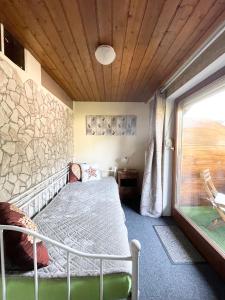 Ένα ή περισσότερα κρεβάτια σε δωμάτιο στο Haus Gertraud