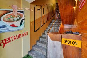 Foto Bangalore’is asuva majutusasutuse SPOT ON Canton Lodging And Boarding galeriist