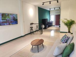 TV a/nebo společenská místnost v ubytování Pai Apart #1