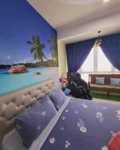 a bedroom with a bed and a view of the ocean at Bali Residence Impian Raudah in Melaka