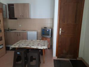 Kuchyň nebo kuchyňský kout v ubytování Apartman Osmancevic