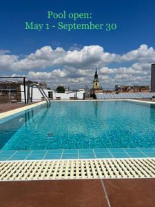 a swimming pool on the roof of a building at K40 Boutique Apartment in the City Center in Budapest