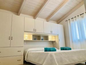 A bed or beds in a room at IL TRAMONTO
